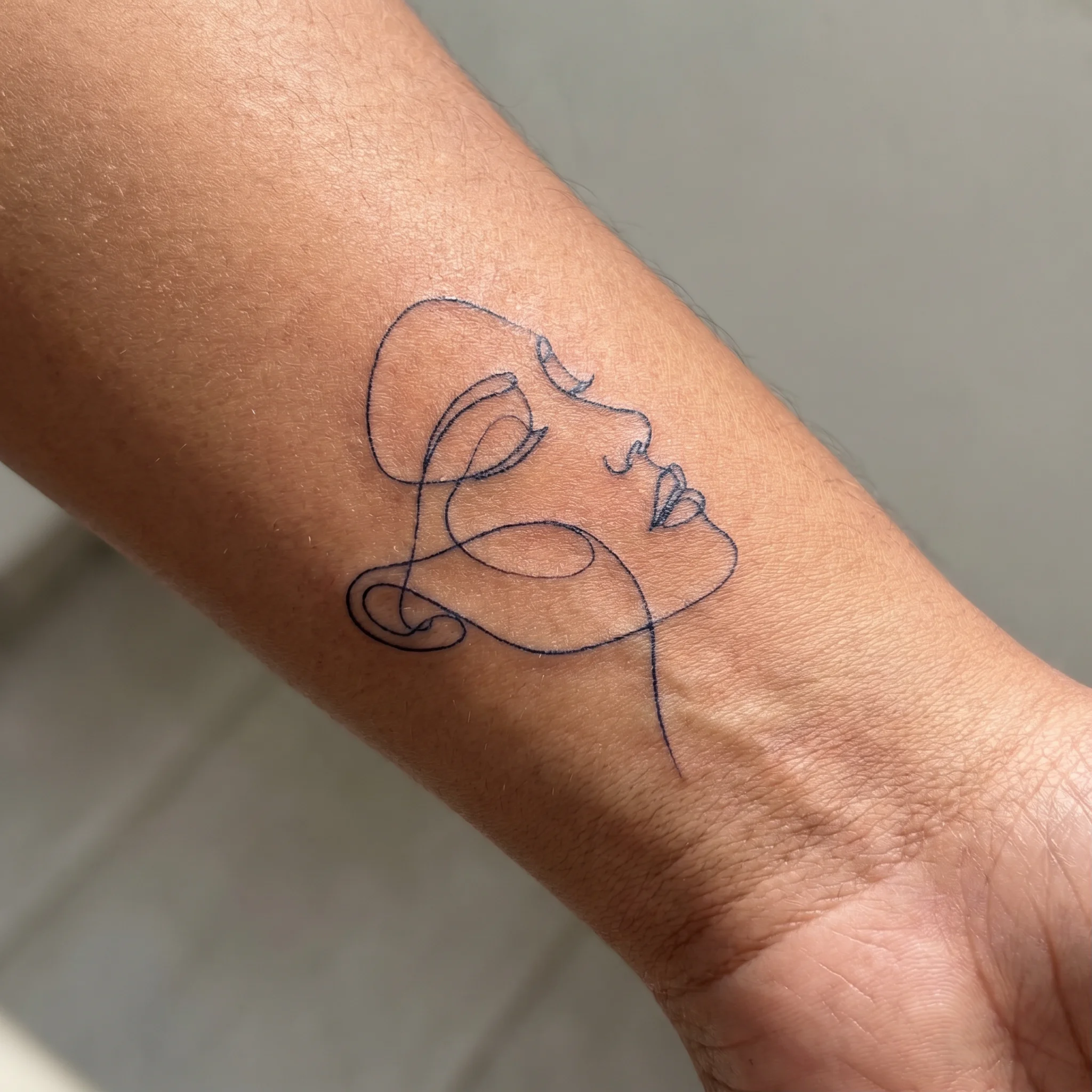 Line01 tattoo on skin
